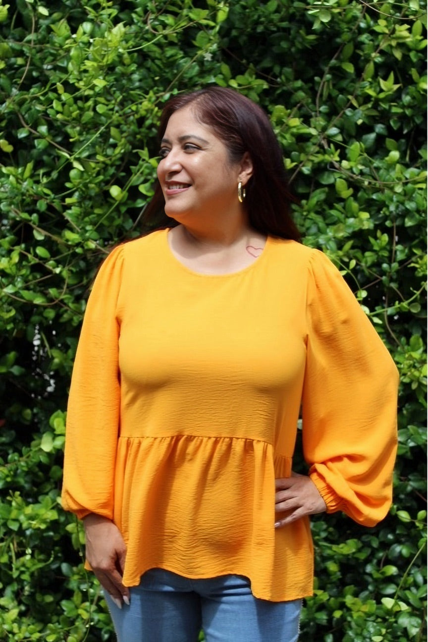 ORANGE RUFFLED HEM BLOUSE