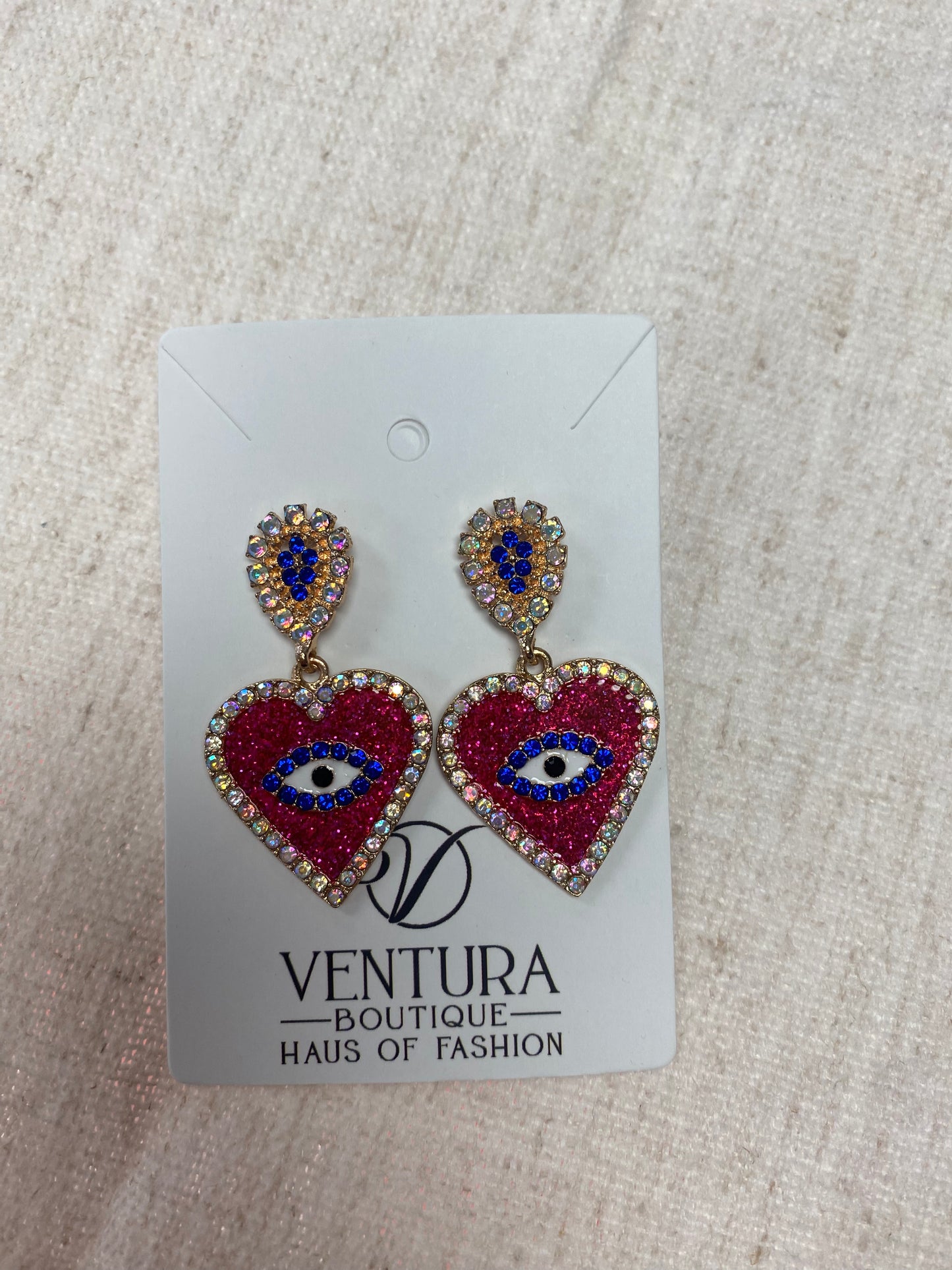 Evil eye earrings pink