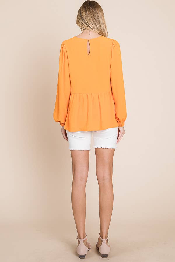 ORANGE RUFFLED HEM BLOUSE