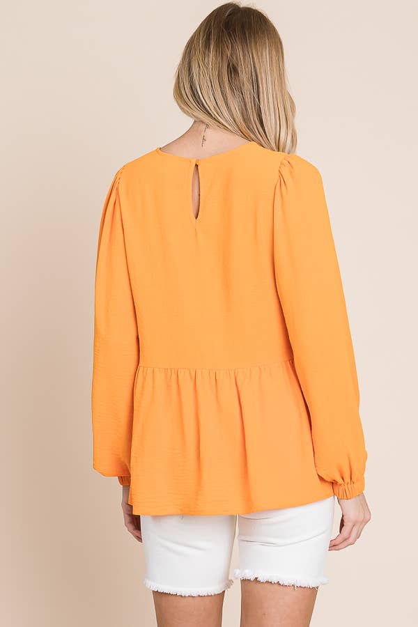 ORANGE RUFFLED HEM BLOUSE